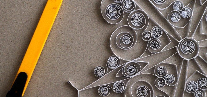 All quilled motifs and parts assembled into a snowflake ornament