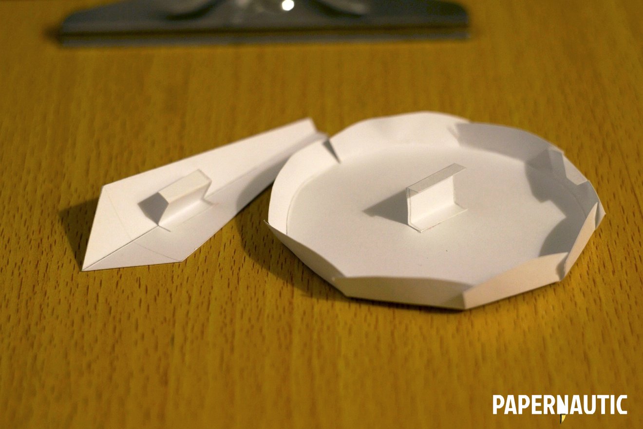 Attached tabs - Paper sculpture assembly
